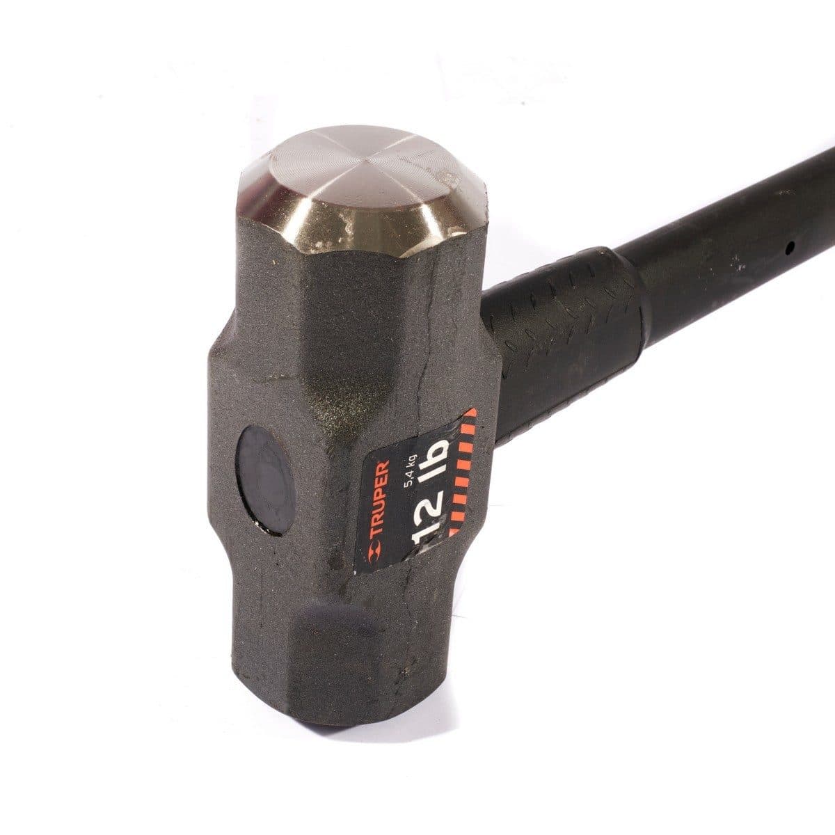 ค้อนปอนด์ ด้าม Fiber 12 ปอนด์ ทรูเปอร์ (TRUPER) รุ่น 16542 ขนาด 36 นิ้ว เหล็กกล้าคาร์บอนสูง ด้านหน้าที่มีการกลึงและเอียงทำให้ลดโอกาสเกิดอุบั